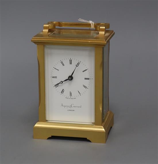 An Asprey gilt brass carriage timepiece